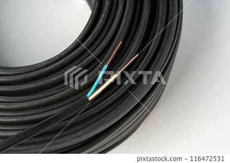 Close Up Of Black Electrical Wire Coil With Blue And White Wires 116472531