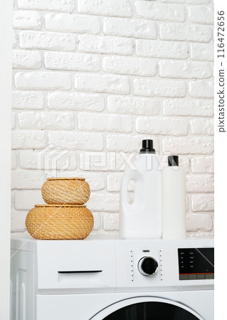 White Laundry Appliances in a Modern Bathroom With White Brick Wall 116472656