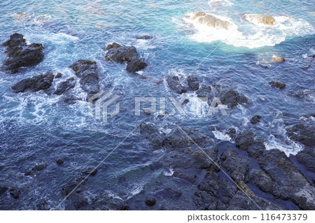 Rocks, blue sea, white waves Rocks, blue sea, white waves 116473379