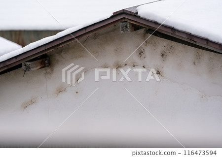 Cracks on the outer wall of the house Cracks on the outer wall of the house 116473594