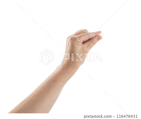 Mid aged female hold transparent pill isolated on white Mid aged female hold transparent pill isolated on white 116476431