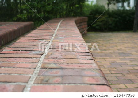 Brick bench in the park 116477056