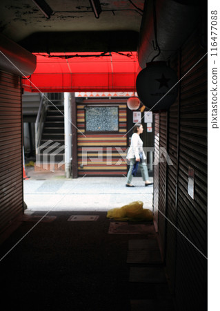 Back alley and passersby 116477088