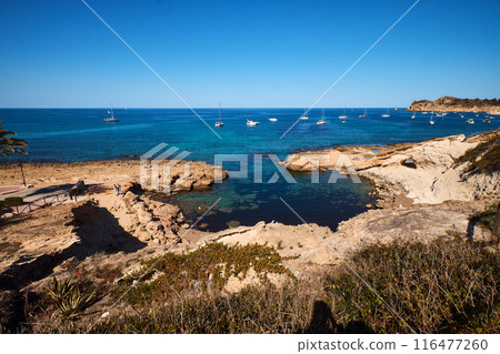 rocky bay calm blue sea rocky bay calm blue sea 116477260