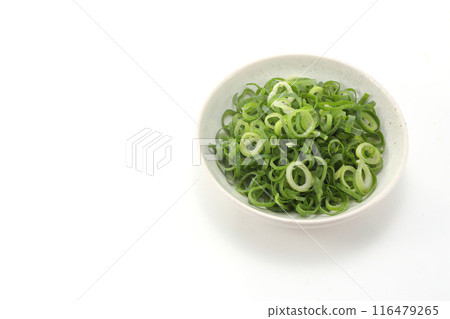 Chopped green onions in a small dish Chopped green onions in a small dish 116479265
