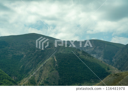 Caucasian mountain. Dagestan. Trees, rocks, mountains, view of the green mountains. Beautiful summer landscape. Caucasian mountain. Dagestan. Trees, rocks, mountains, view of the green mountains. Beautiful summer landscape. 116481978