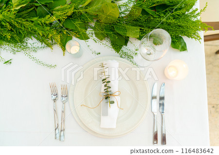 beautifully decorated table with flowers beautifully decorated table with flowers 116483642