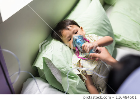 Asian RSV patient kid therapy of oxygen inhaler mask by nurse 116484501