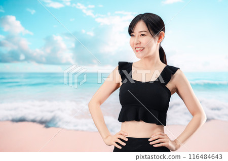 Woman in swimsuit enjoying the beach 116484643