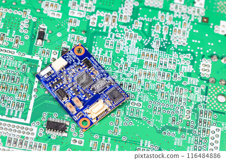 tiny circuit board, IOT device, nano computer circuit board isolate on green computer circuit board. tiny circuit board, IOT device, nano computer circuit board isolate on green computer circuit board. 116484886