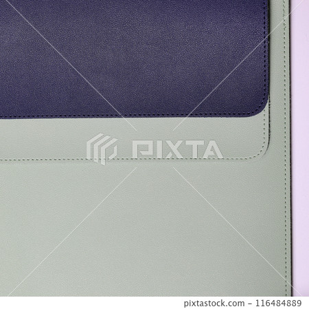 close up light green and dark blue artificial leather texture with stitched or seam background. close up light green and dark blue artificial leather texture with stitched or seam background. 116484889