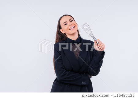 Young thoughtful pensive wistful fun housewife. Cooking food process concept. 116485125