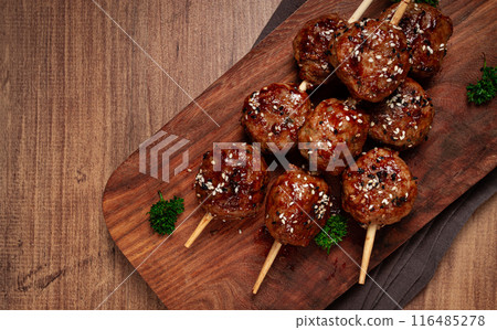 Tsukune, Japanese meatballs, minced chicken, fried on a skewer, with yakitori sauce, homemade, no people, 116485278