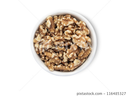 Bowl plate with healthy organic walnut nuts isolated on white background. 116485327