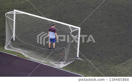 Football goalkeeper stands on the goal. Selective focus 116485868