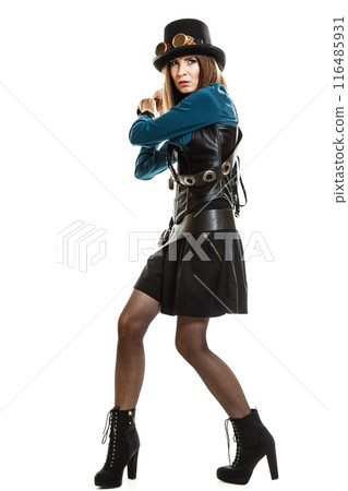steampunk woman holding a gun isolated. 116485931