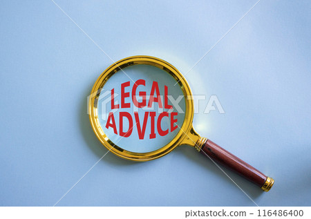 Legal advice symbol. Magnifying glass with words Legal advice. Beautiful blue background. Business and Legal advice concept. Copy space. Legal advice symbol. Magnifying glass with words Legal advice. Beautiful blue background. Business and Legal advice concept. Copy space. 116486400