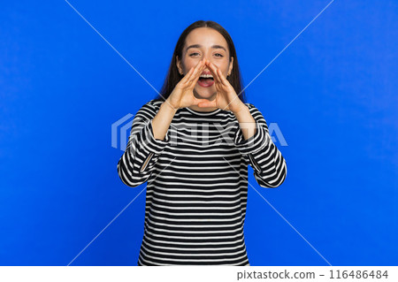 Caucasian woman yell shout scream loud to camera promotion advertisement sale invitation greetings 116486484