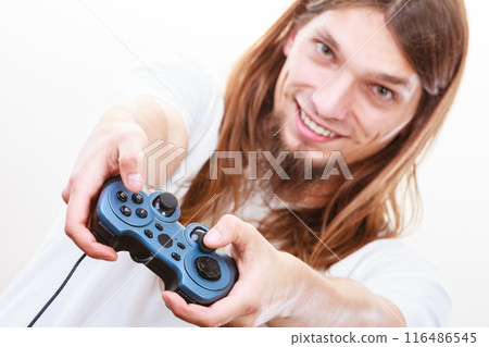 Happy man playing games Happy man playing games 116486545