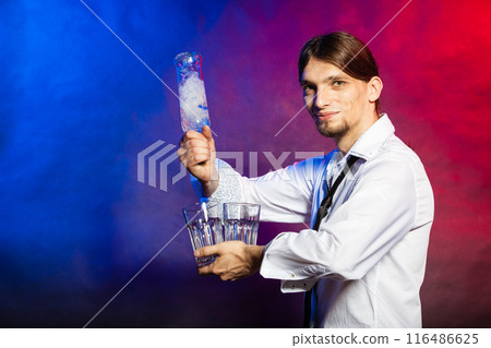 Barman with bottle and glasses. 116486625