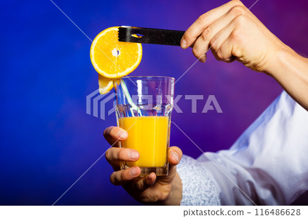 Young man bartender preparing alcohol cocktail drink 116486628