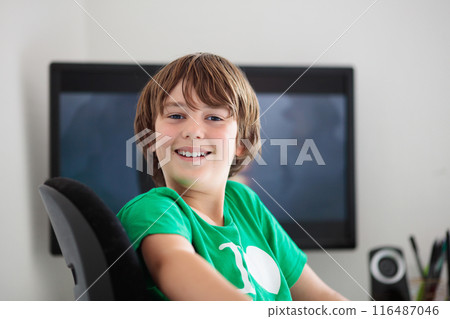 Child in school. Student in class. Boy at homework Child in school. Student in class. Boy at homework 116487046