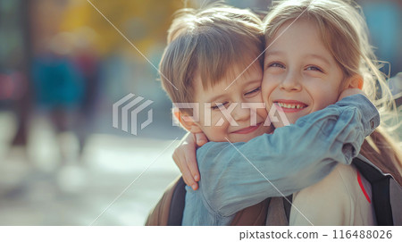 Sibling Embrace on a Sunny City Street 116488026