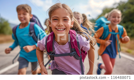 Joyful Children Running Together on a Sunny Day 116488071