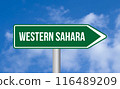 Western sahara road sign on cloudy sky background 116489209