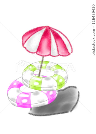 Parasol and swim ring on the beach 116489430