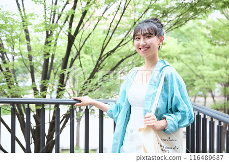 Female college student walking on campus 116489687