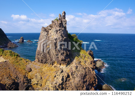The stone pillars of Tako in Shimane-cho, Matsue City, with the blue sky and the Sea of Japan in the background Ver1 The stone pillars of Tako in Shimane-cho, Matsue City, with the blue sky and the Sea of Japan in the background Ver1 116490252