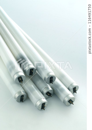 Group photo of blackened used fluorescent lamps 116491750