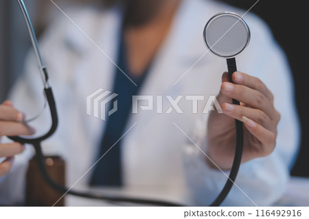 picture of doctor hand with stethoscope listening something picture of doctor hand with stethoscope listening something 116492916