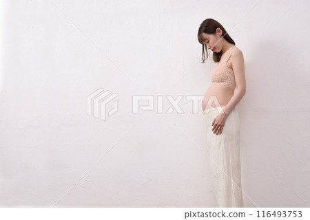 Young pregnant woman 116493753