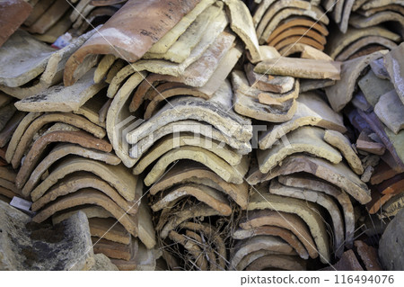 Detail of old baked clay tiles, protection for roofs 116494076