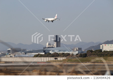 Osaka Airport, Itami Airport, airplanes landing from the Senri River bank Osaka Airport, Itami Airport, airplanes landing from the Senri River bank 116494426