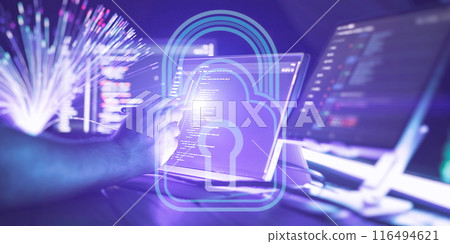 Cyber security and information protection concept. Close up of man hand using laptop computer with padlock icon on screen. Cyber security and information protection concept. Close up of man hand using laptop computer with padlock icon on screen. 116494621