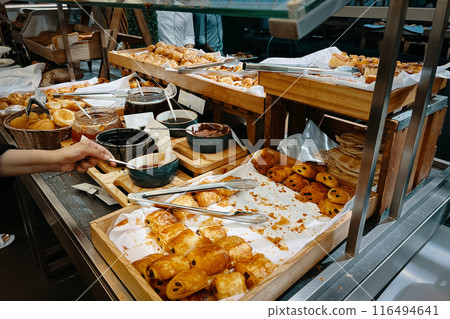 A variety of flaky morning croissants, fresh pastries, and the hotel's breakfast buffet. 116494641