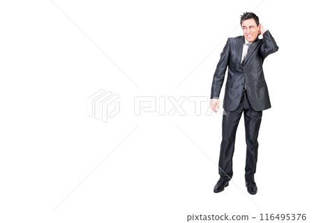 Timid male entrepreneur touching head and looking away Timid male entrepreneur touching head and looking away 116495376