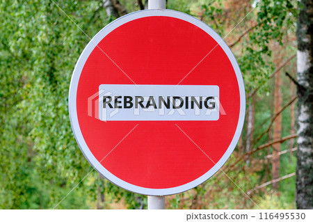 Idea for rebranding strategy. marketing, brand management. REBRANDING word written on the sign entry is prohibited against the background of the forest Idea for rebranding strategy. marketing, brand management. REBRANDING word written on the sign entry is prohibited against the background of the forest 116495530
