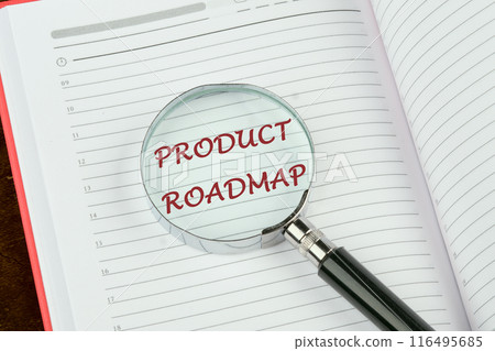 Education concept. Text PRODUCT ROADMAP through a magnifying glass on a notepad page Education concept. Text PRODUCT ROADMAP through a magnifying glass on a notepad page 116495685