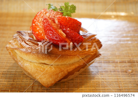 Danish bread topped with strawberries Danish bread topped with strawberries 116496574