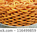 bagel shaped sweet with syrup 116499859