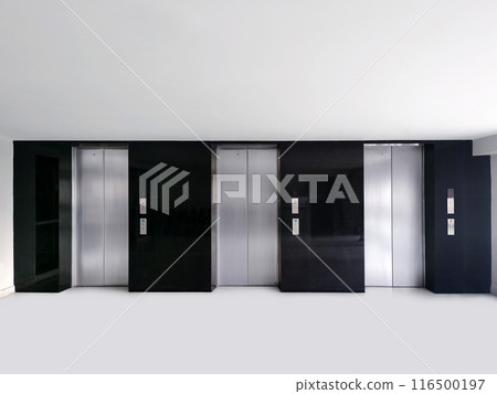 elevator door closed Metal chrome office building elevator real photo 116500197