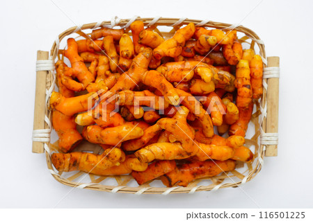Turmeric roots on white background. Turmeric roots on white background. 116501225