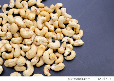 Cashew nuts on dark background. 116501507