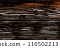 Dark rustic burnt wood background. 116502213