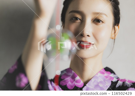 Woman in black yukata Woman in black yukata 116502429