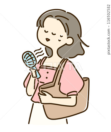 A woman using a small fan A woman using a small fan 116502582